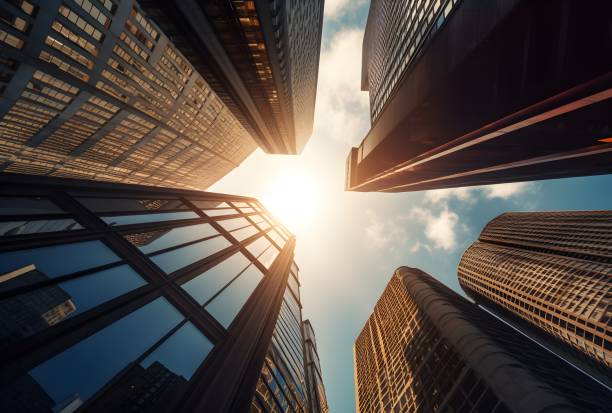 Looking directly up at the skyline of the financial